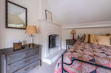 Fabulous features include this ornamental fireplace.