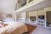 The mezzanine sits above this bedroom. Please note it is not suitable for children.