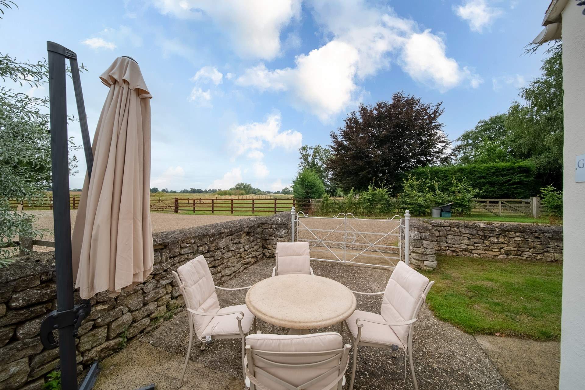 The outside space is surrounded by the countryside. Perfect for summer barbecues.