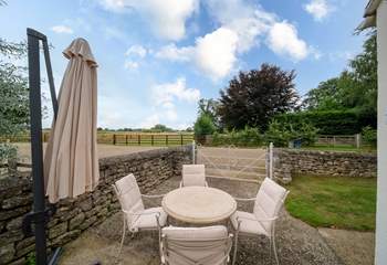 The outside space is surrounded by the countryside. Perfect for summer barbecues.