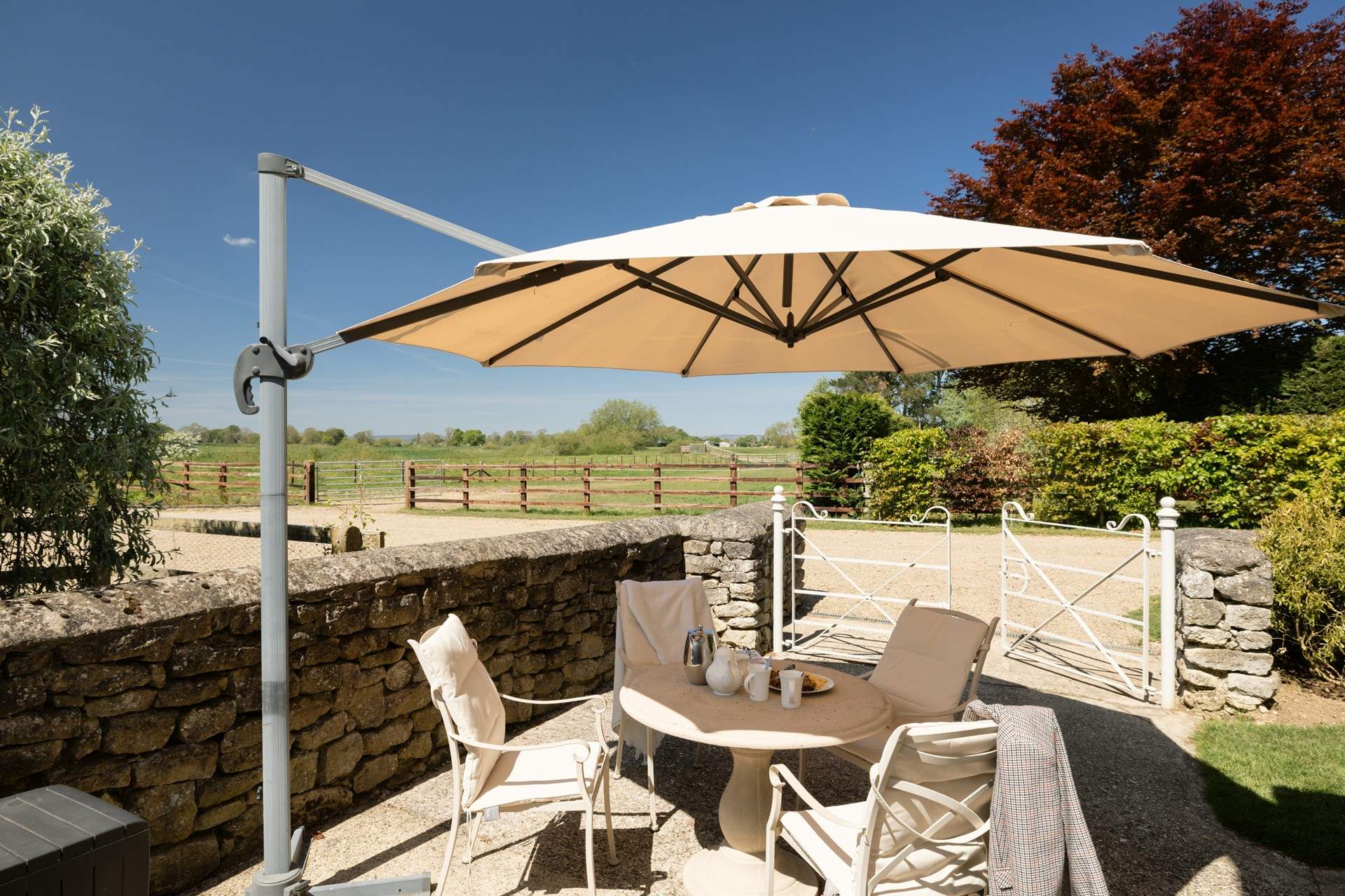 The outside space is surrounded by the countryside. Perfect for summer barbecues.