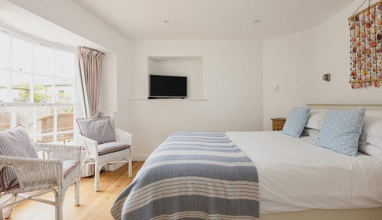 This pretty bedroom is a relaxing spot for anyone wanting a moments peace after a day spent exploring.