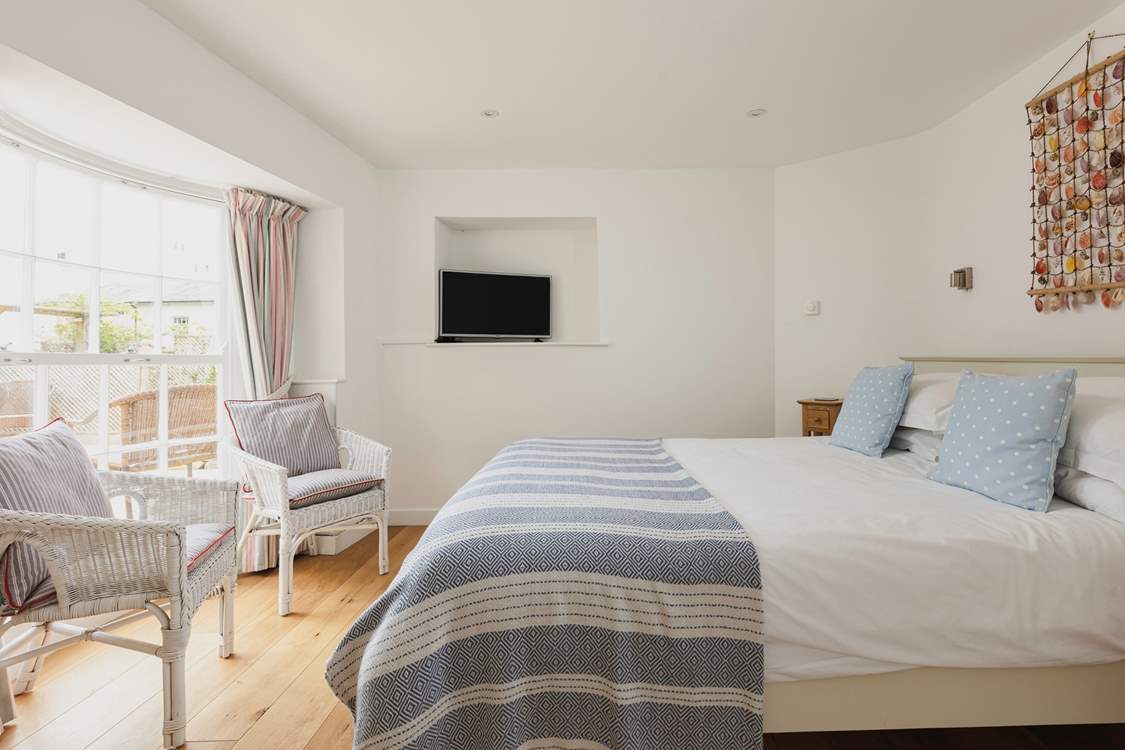 This pretty bedroom is a relaxing spot for anyone wanting a moments peace after a day spent exploring.