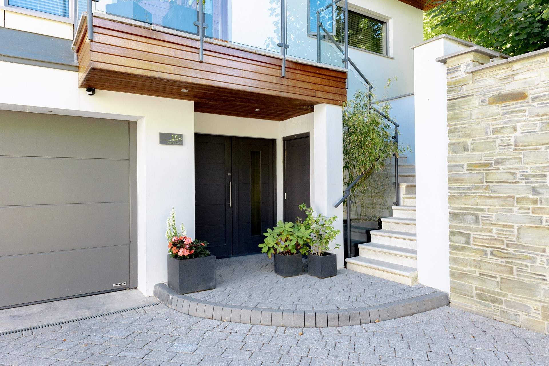 There are entrances on both the ground and first floors.