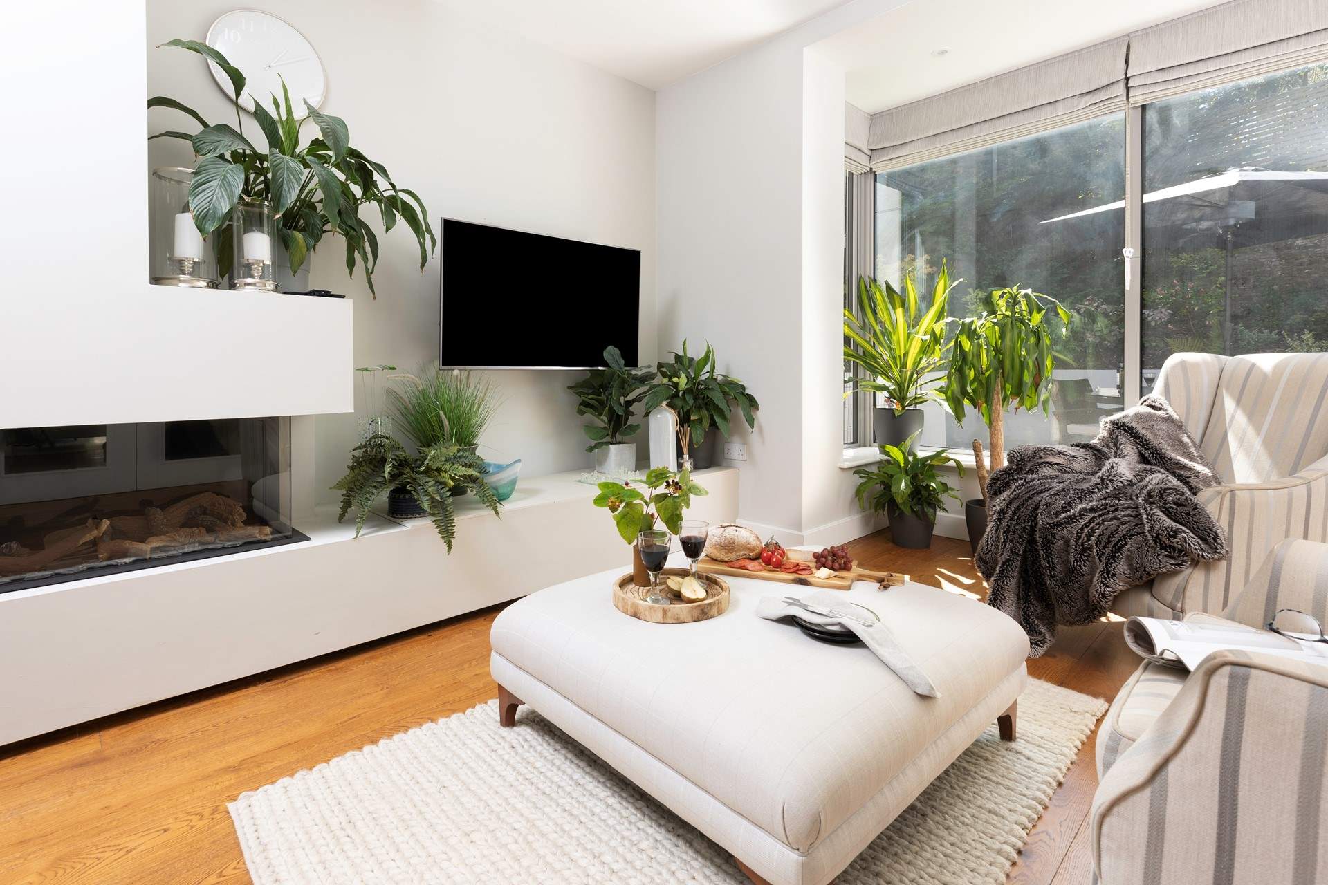 The separate sitting-room offers another gorgeous place to unwind.