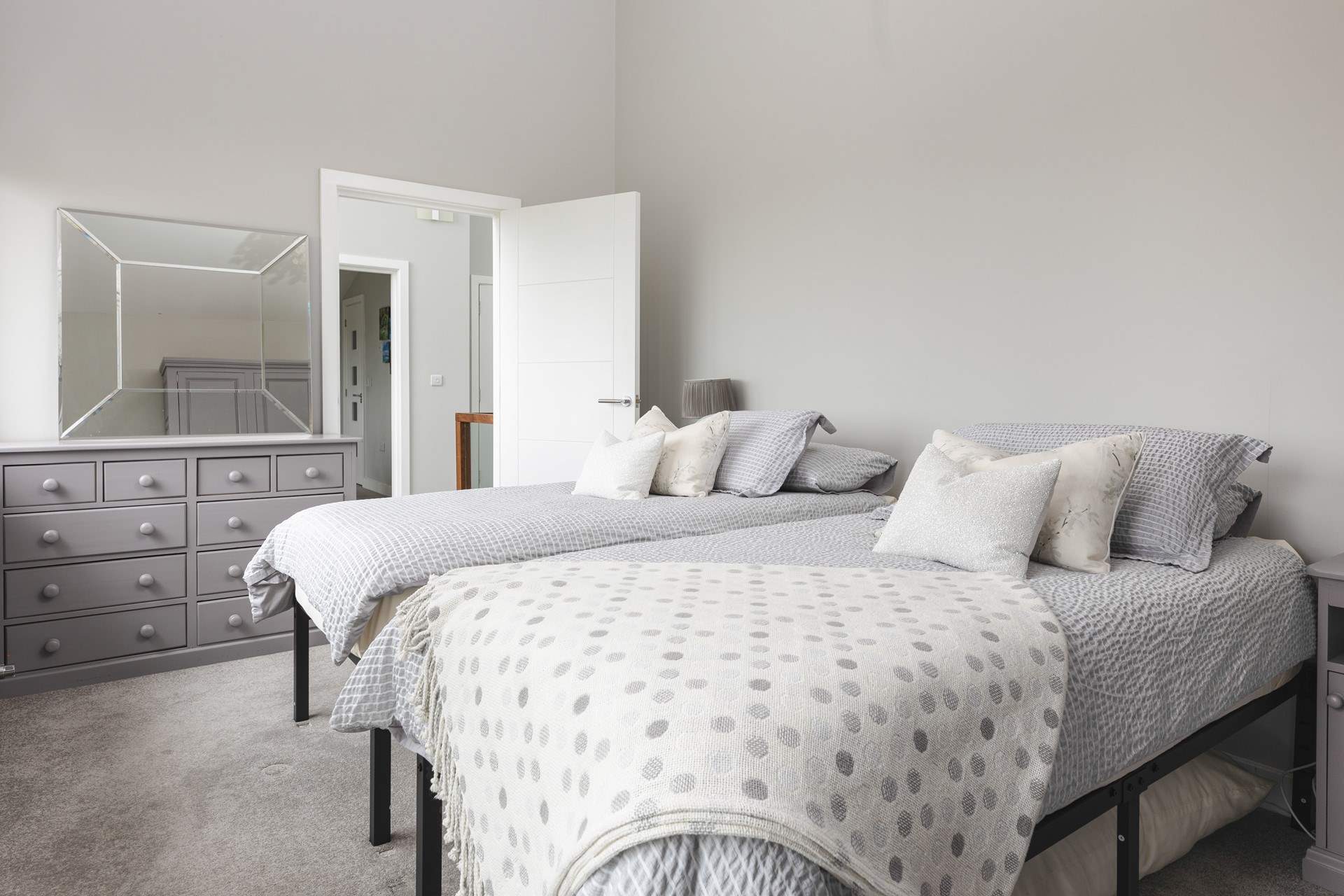 Bedroom 4 has twin beds and is lovely space to relax and unwind.