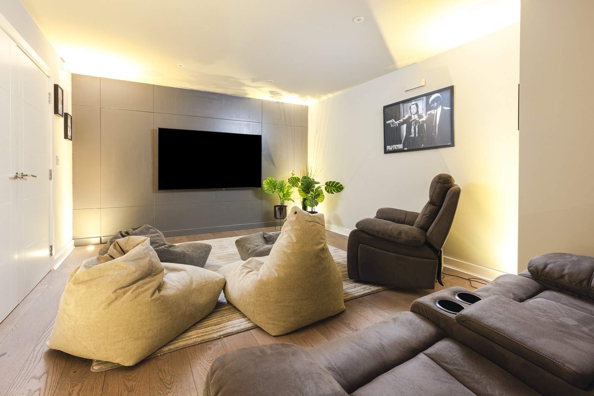 A fabulous cinema room can be found on the ground floor.