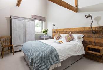 A beautifully relaxing room complemented by original beams.