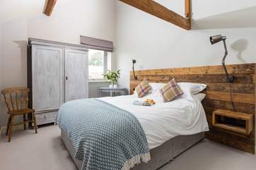 A beautifully relaxing room complemented by original beams.