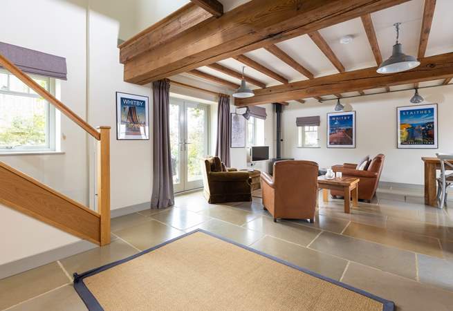 The stairs lead off the open plan living area.