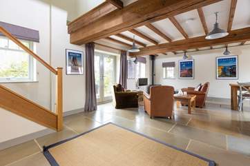 The stairs lead off the open plan living area.