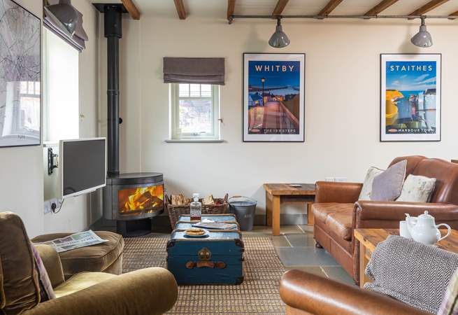 Relax in front of the cosy wood-burner after a day on the moors.