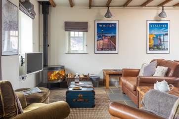 Relax in front of the cosy wood-burner after a day on the moors.