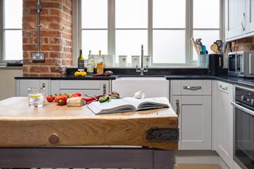 The vintage chopping block is perfect for preparing a culinary delight.