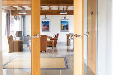 The large entrance hall leads into the open plan living space.
