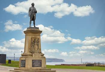 Captain Cook watches over Whitby harbour.