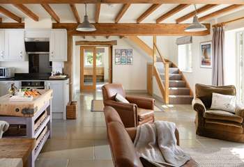 The stairs lead off the open plan living area.