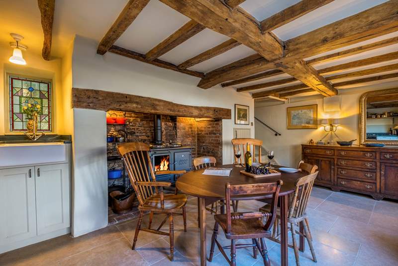 On the ground floor, the characterful living space is warmed by under-floor heating.