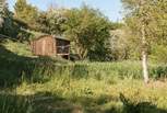 Perched in a meadow and surrounded by woodland, this is a nature lover's dream getaway. 