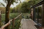 The lovely raised decking is made from reclaimed branches.