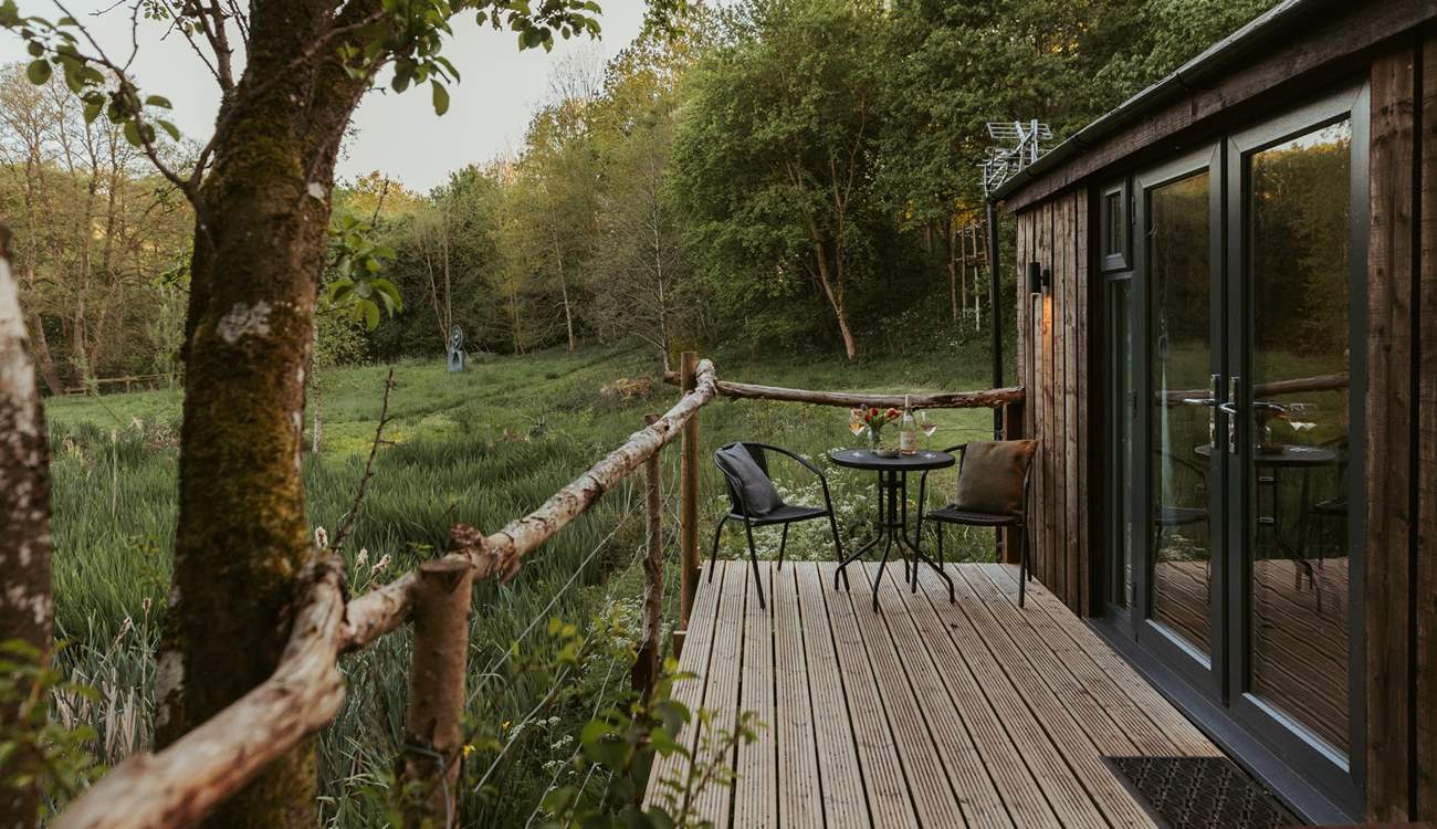 The lovely raised decking is made from reclaimed branches.