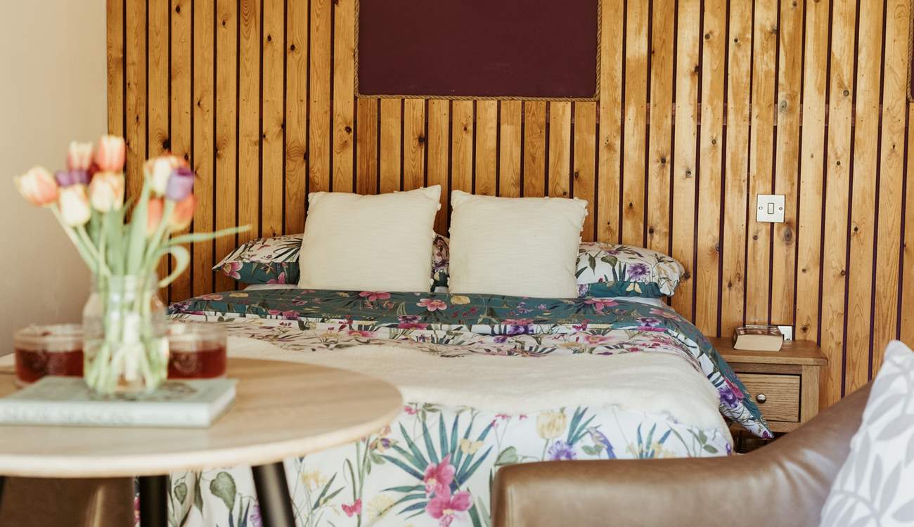 The sumptuous double bed promises a blissful night's rest. 