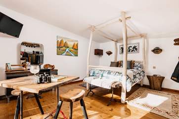Quirky, handcrafted furniture fills the treehouse, making it the most unique retreat.