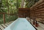 Or soak in the outdoor bathtub as you listen to the sweet sound of birdsong.