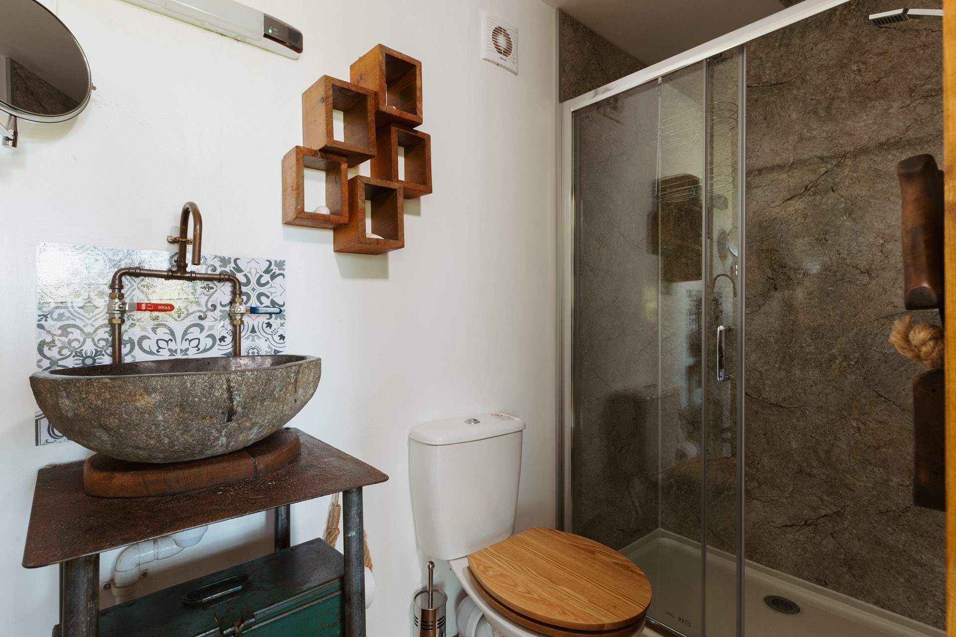 The stylish shower-room is perfect for freshening up after a day of adventures. 