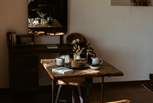 The dappled sunlight makes the space warm and inviting. 