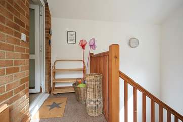 A small landing area sits outside the front door.