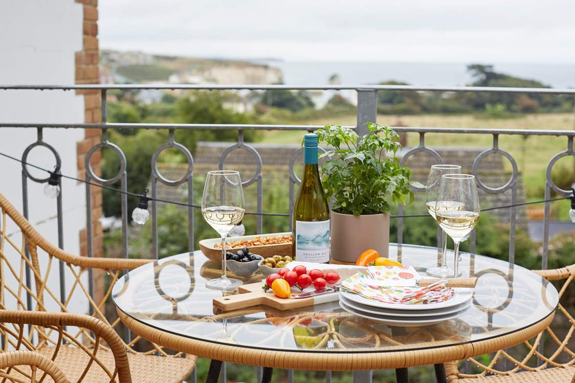 Treat yourself to a spot of al fresco dining on the fabulous balcony with sea views.
