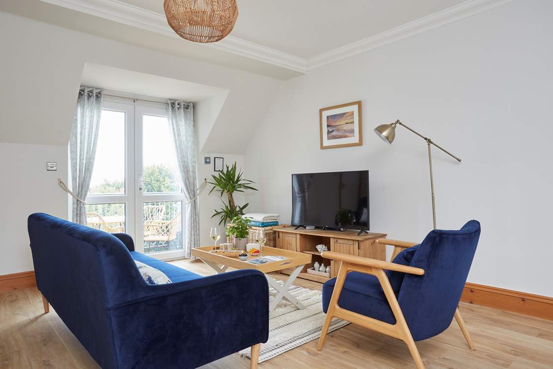 Settle down in the light and airy living space.