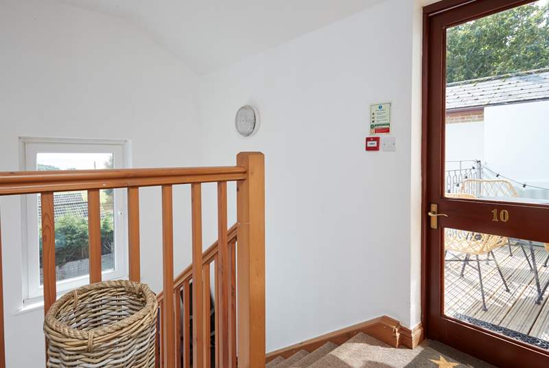 The balcony can also be accessed from the small landing outside the flat.