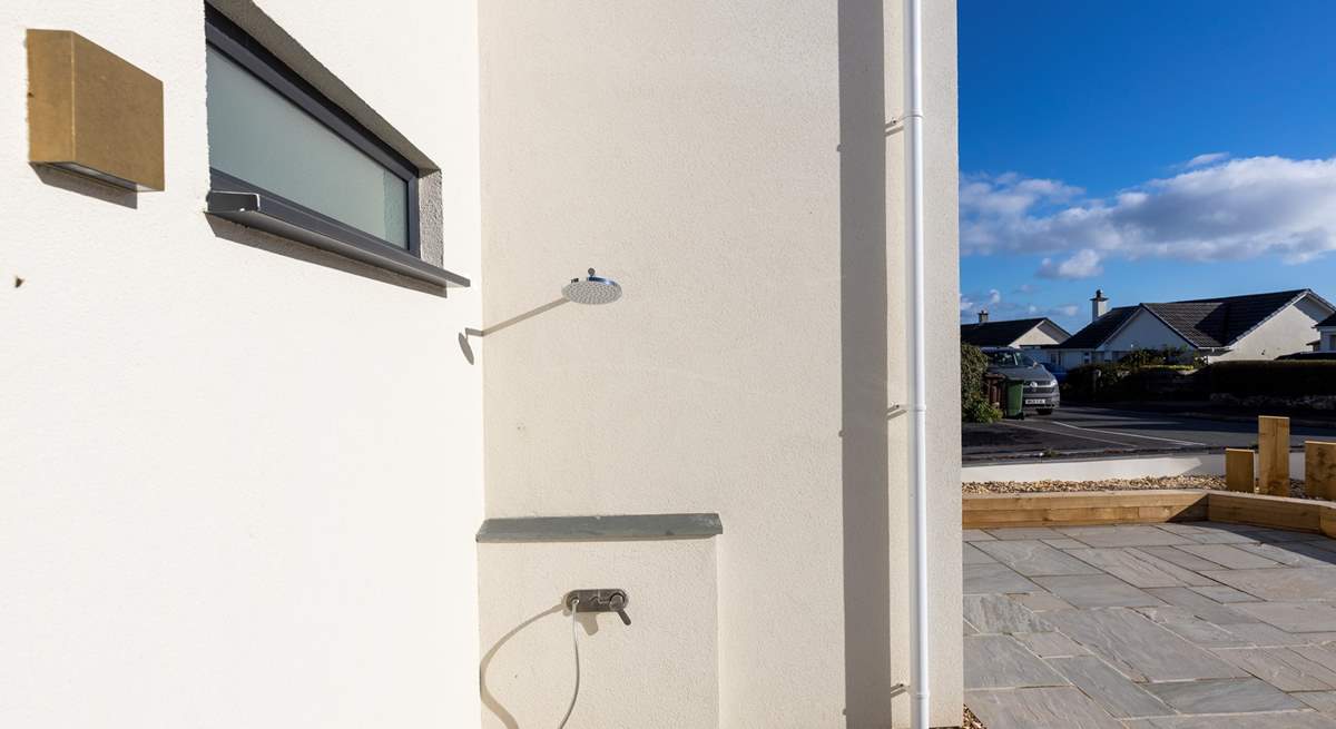 Rinse sandy toes, wetsuits and salty dogs in the handy outside shower at the front of the property.