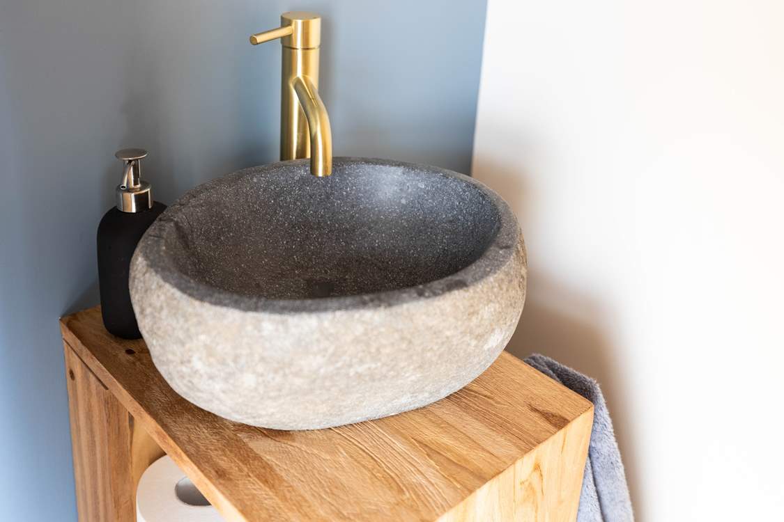 The ground floor WC has a quirky wash-basin.