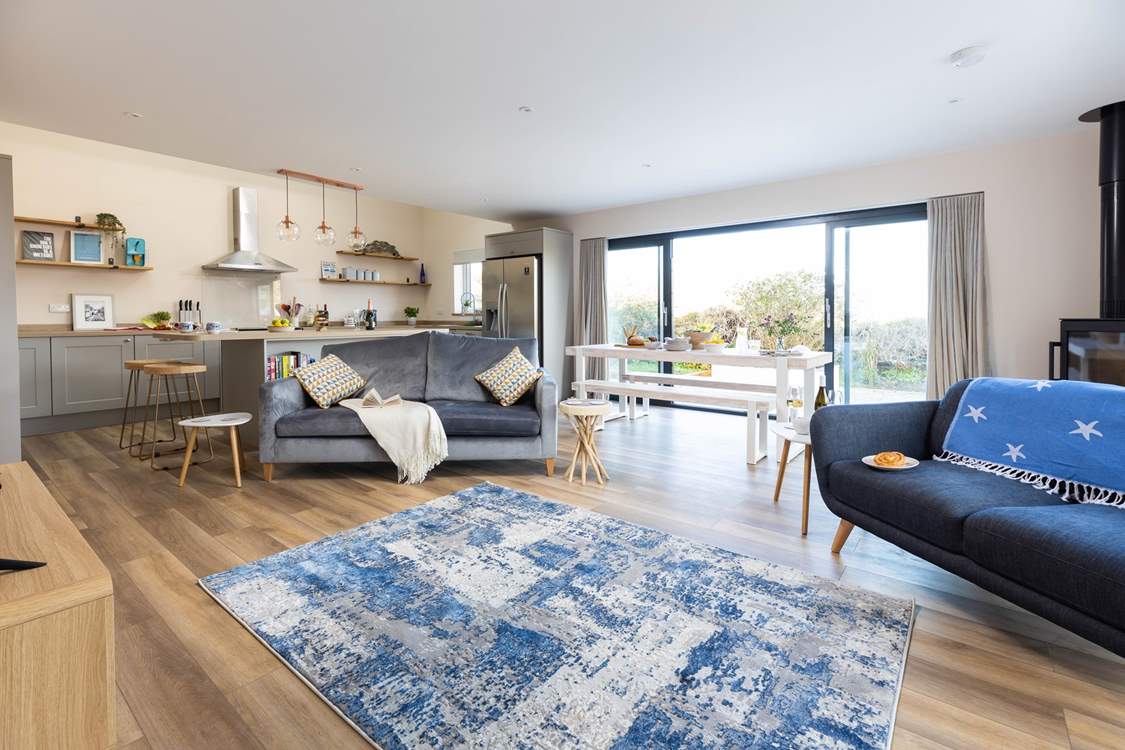 Gorgeous blue and grey tones in the sitting-room.