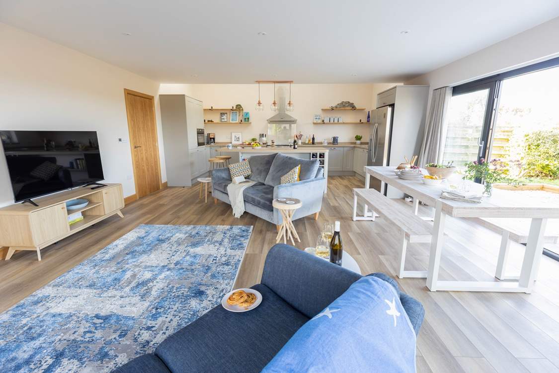 After a busy beach day snuggle up on the comfy sofas and watch a movie on the Smart TV.