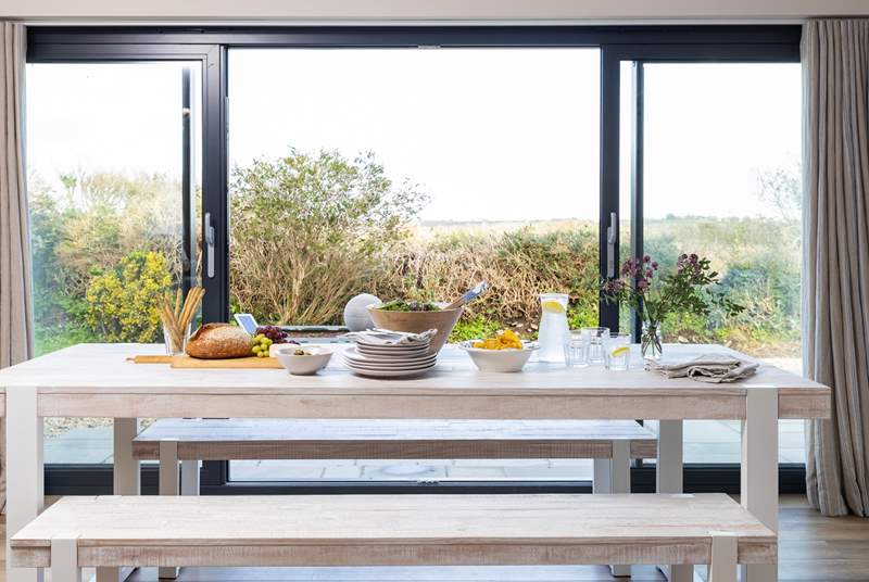 Open the bi-fold doors and let the fresh sea air in.