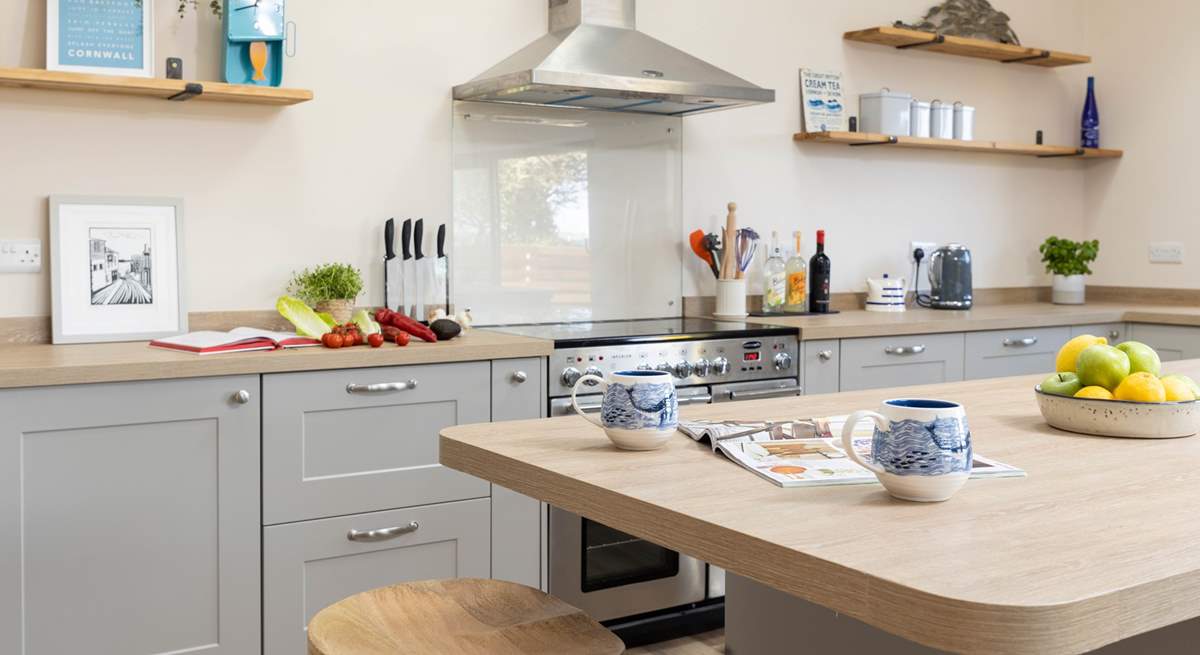 Guests can perch at the breakfast bar and supervise the chef.