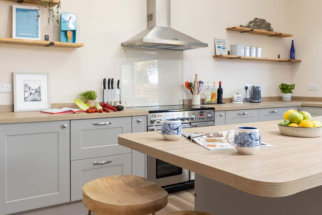 Guests can perch at the breakfast bar and supervise the chef.