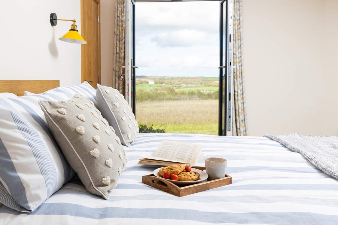 Throw open the doors to the Juliette balcony in bedroom 2 and breathe in the fresh air.