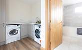 A handy utility-room is home to a washing machine and tumble-drier. - Thumbnail Image