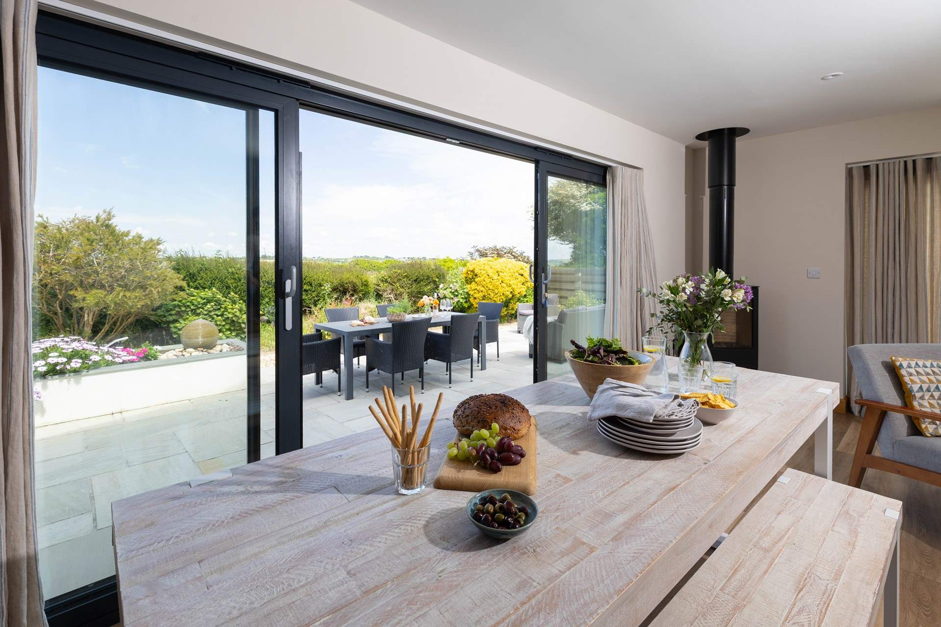 Open the bi-fold doors and let the fresh sea air in.