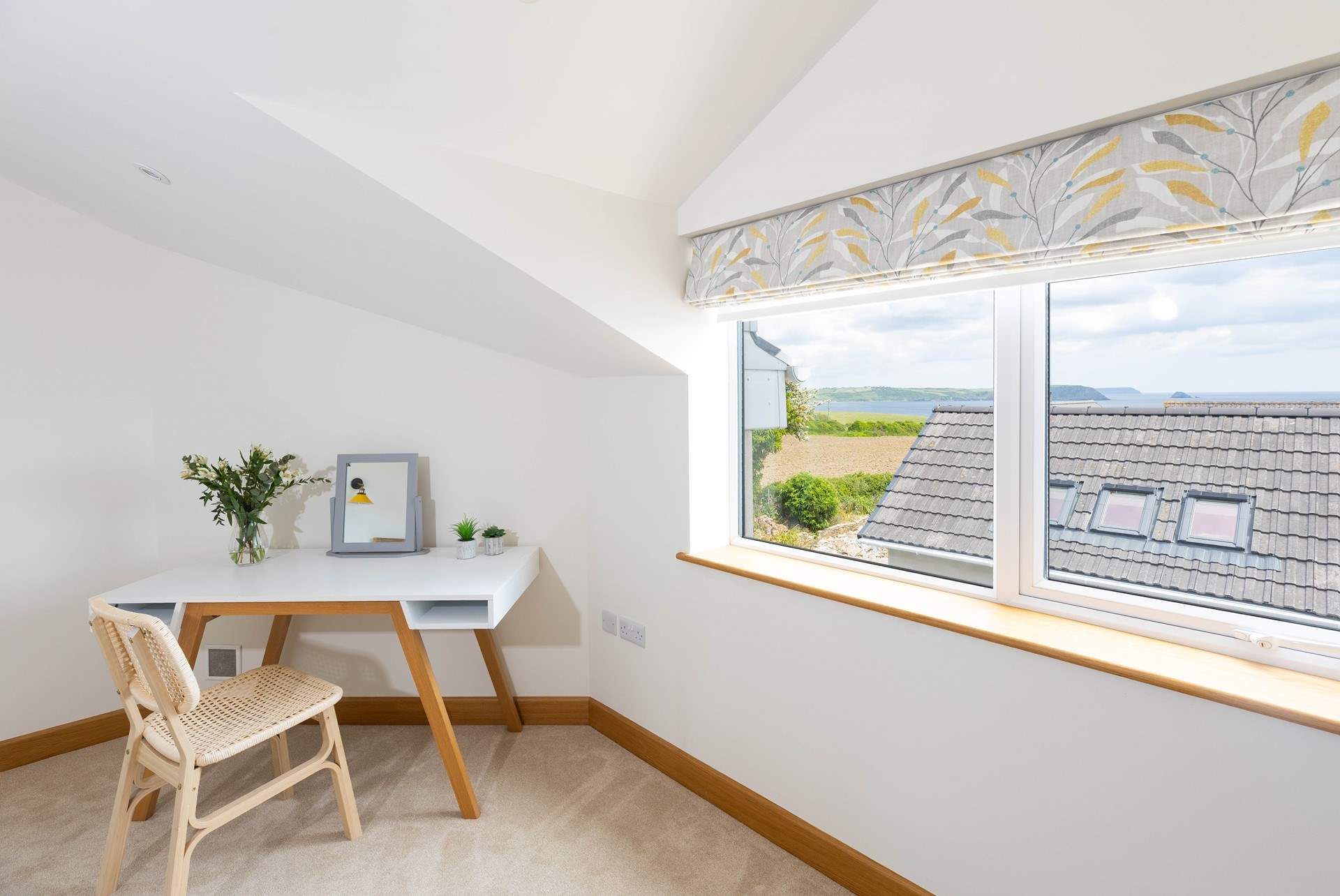 Bedroom 2 has blissful views over the bay. 
