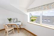 Bedroom 2 has blissful views over the bay.