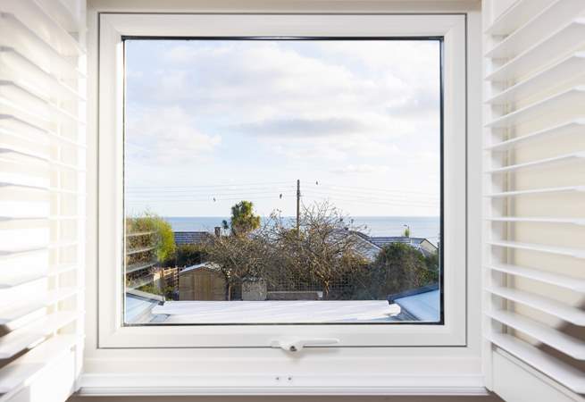 Looking out over the rooftops towards Gull Rock and Gerrans Bay.