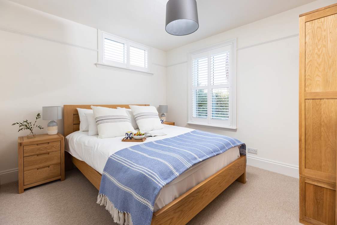Bedroom 2 with king-size bed is on the ground floor.