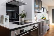 You will find all the equipment you need here including the all important wine fridge and two ovens.