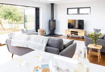 The wood-burner will keep you cosy during cooler months.